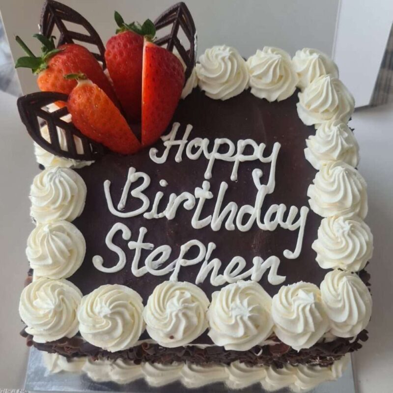 Chocolate covered cake in vanilla