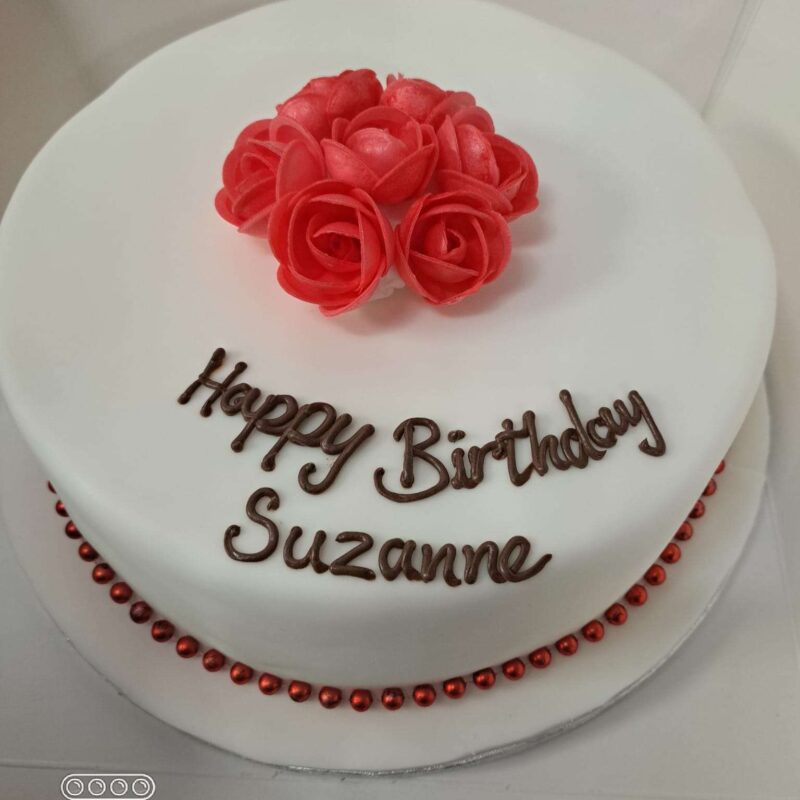 White fondant icing with red Flower