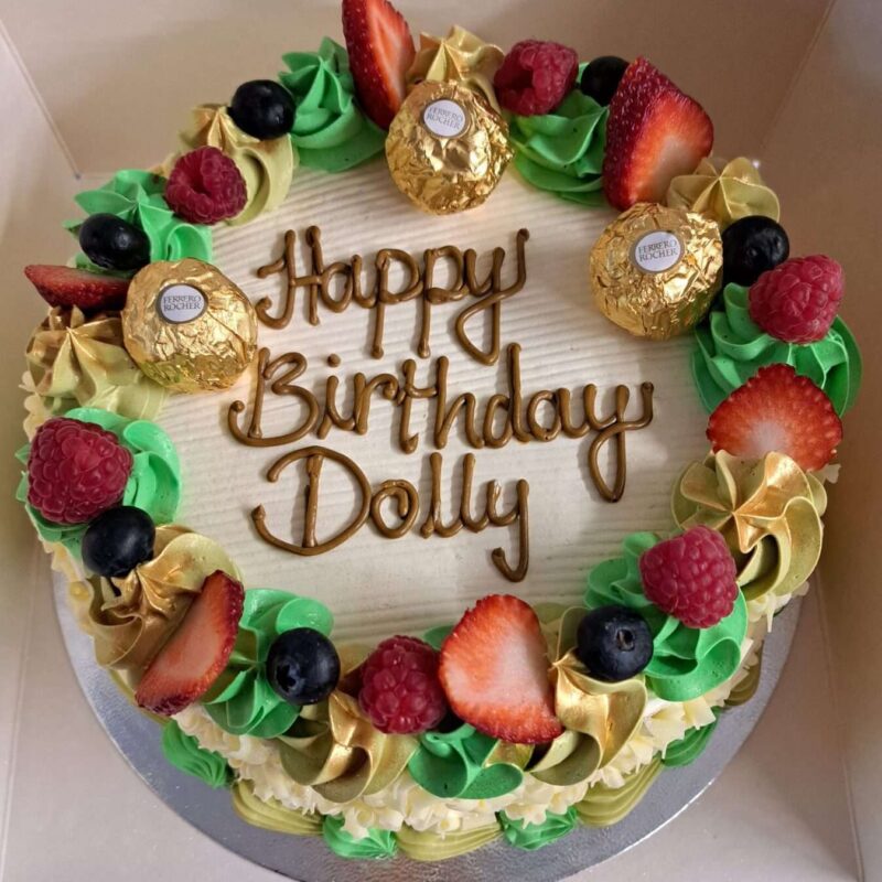 Gold and Green cake in round-fruits on top