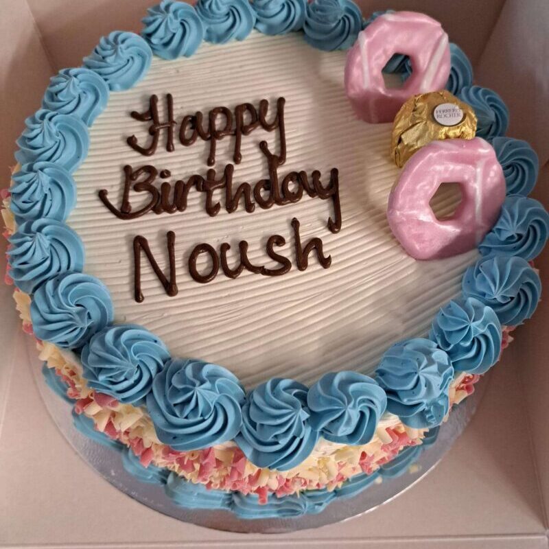 Blue Piping cake with pink curl