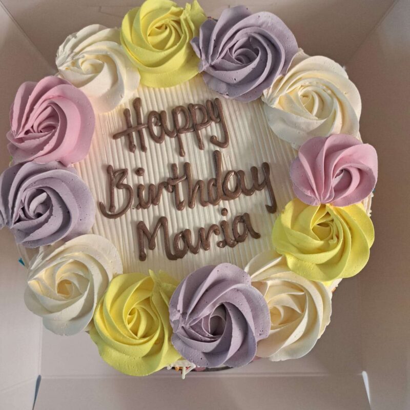 Rainbow Cake with rainbow Piping