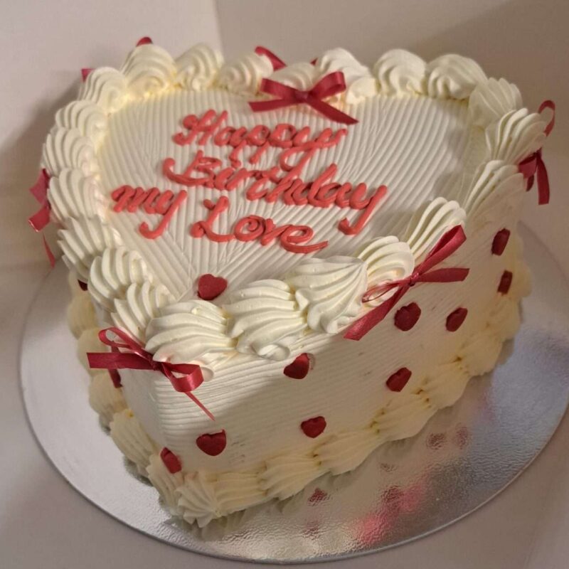 White Heart Cake with Red Bow on the side