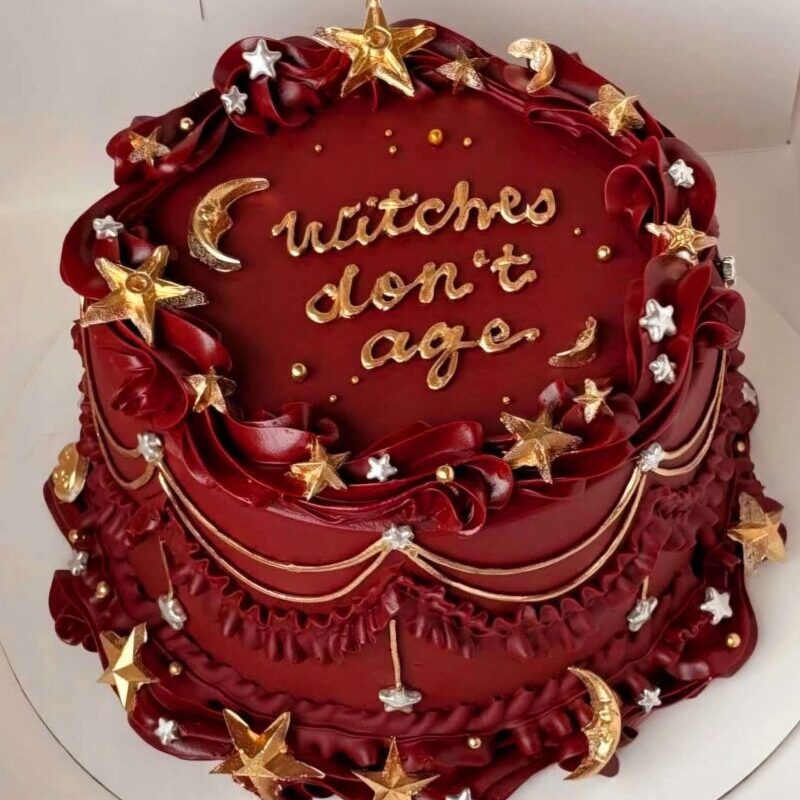Maroon trend cake with stars and moon