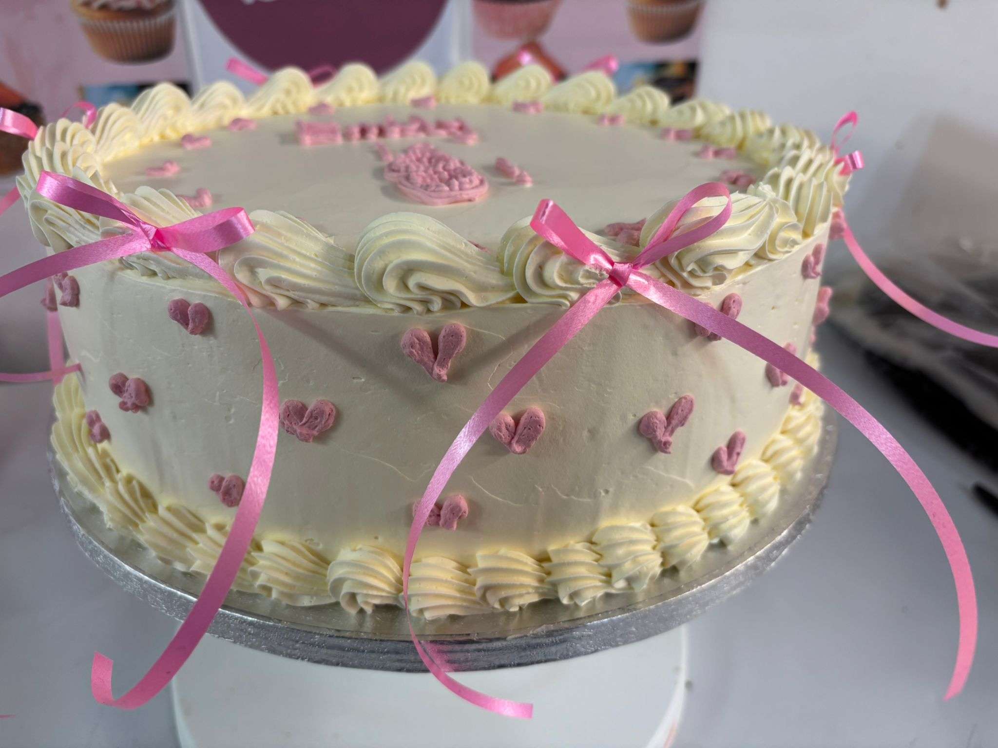 Elegant White Cake with Heart & Bow - Image 3